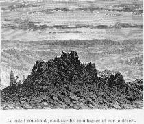 Le soleil couchant jetait sur les montagnes et sur le d�sert.