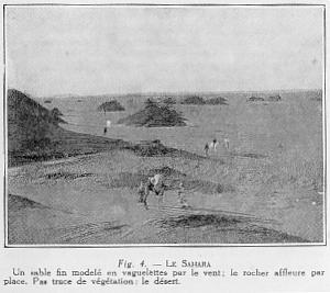 Fig. 4. - LE SAHARA Un sable fin model� en vaguelettes par le vent; le rocher affleure par place. Pas trace de v�g�tation: le d�sert.